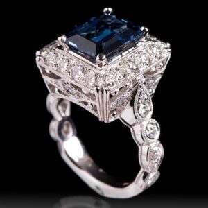 women's ring with blue gem and diamonds